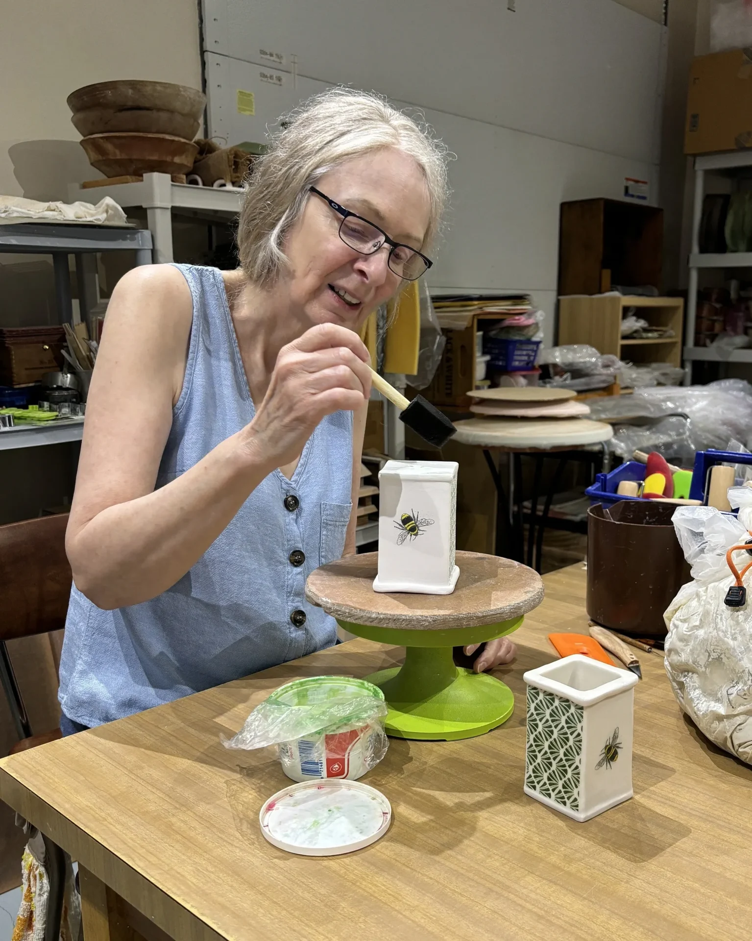 A woman is eating food at the table